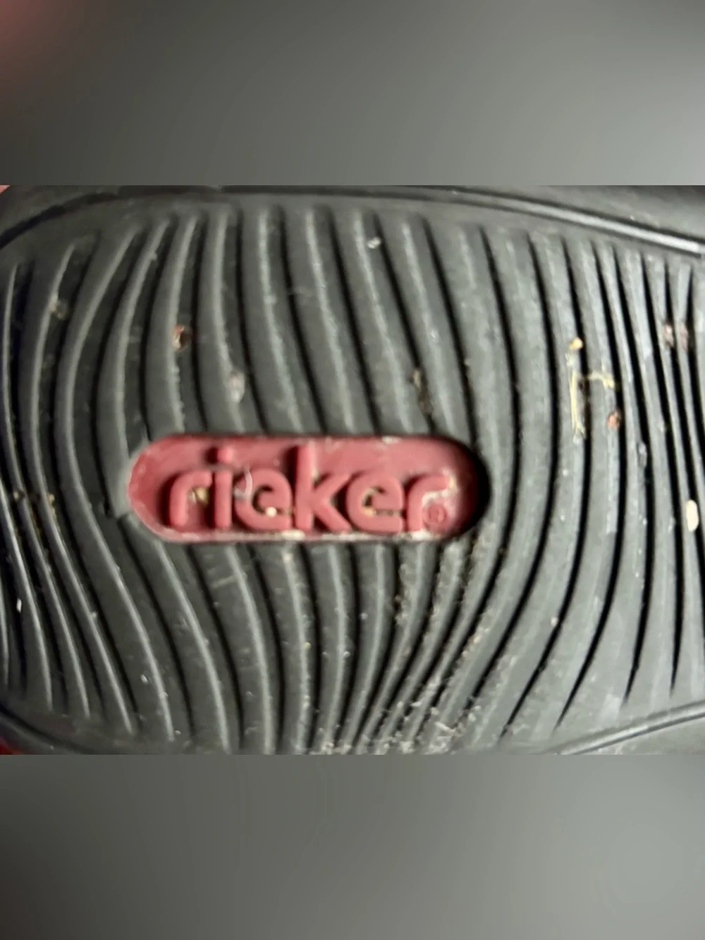 Rieker Black Slip-On Mule Loafers with Patterned Midsole